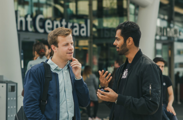 A bystander and an outreacher are having a conversation